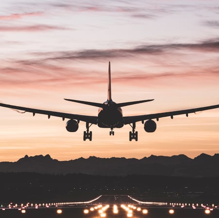 Plane landing sunrise